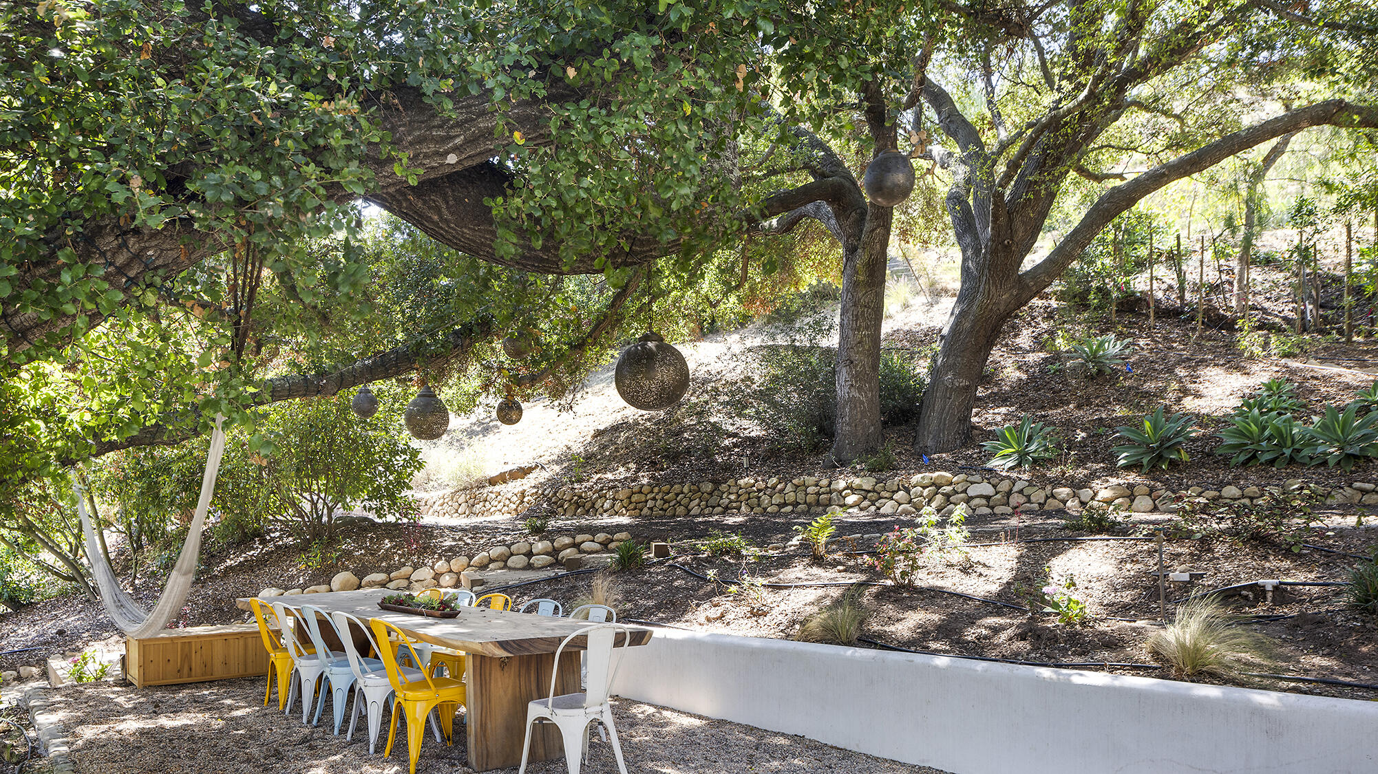 1545 San Roque Road Santa Barbara, CA 93105 - Photo 51 of 60 a backyard of a house with table and chairs