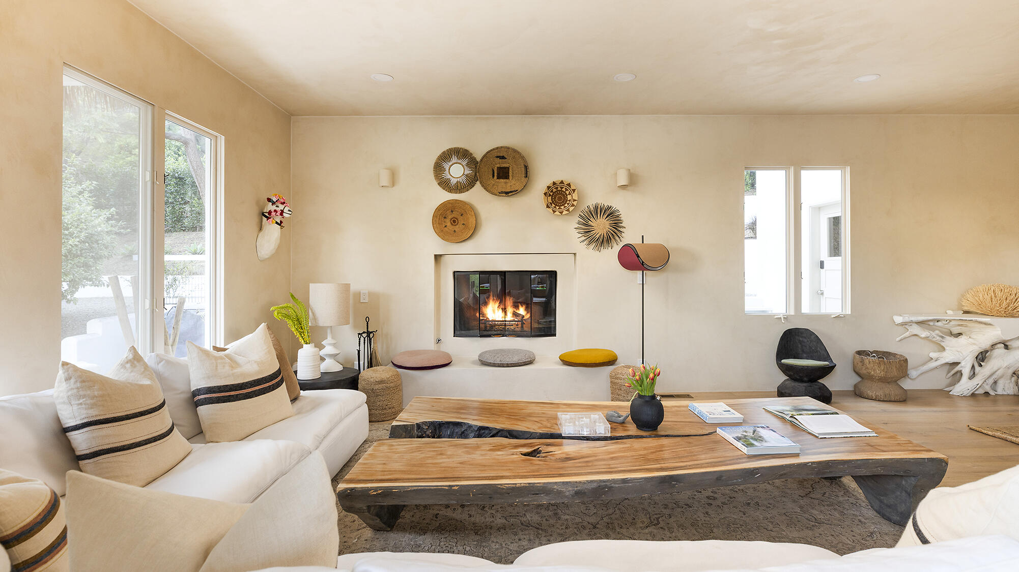 1545 San Roque Road Santa Barbara, CA 93105 - Photo 10 of 60 a living room with furniture and a fireplace