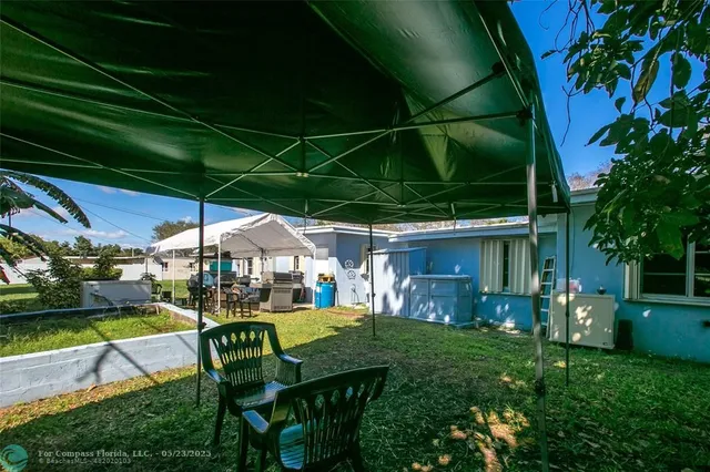 a view of yard with patio