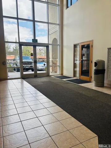 a view of an empty room with a fireplace
