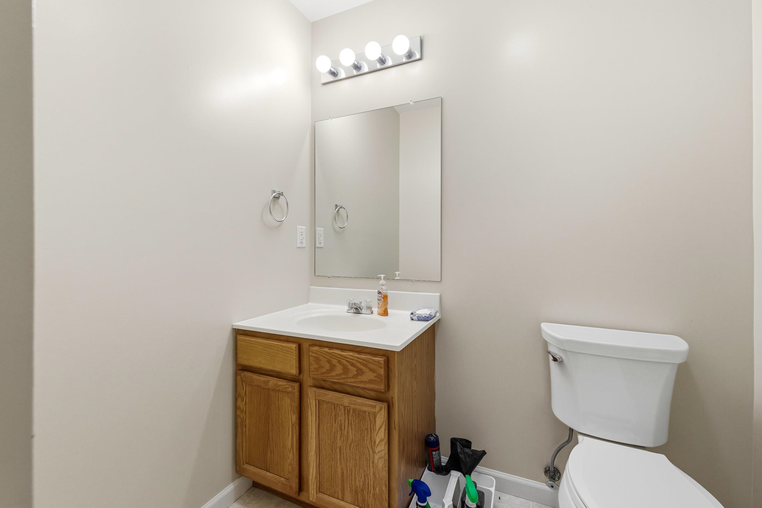 730 Merlins Way Harrisonburg, VA 22801 - Photo 12 of 23 a bathroom with a sink vanity mirror and toilet