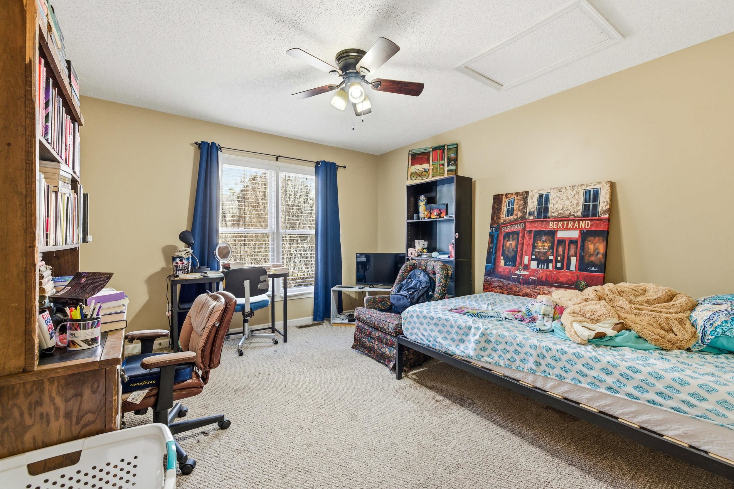 730 Merlins Way Harrisonburg, VA 22801 - Photo 17 of 23 a bedroom with a bed a large window and book shelf