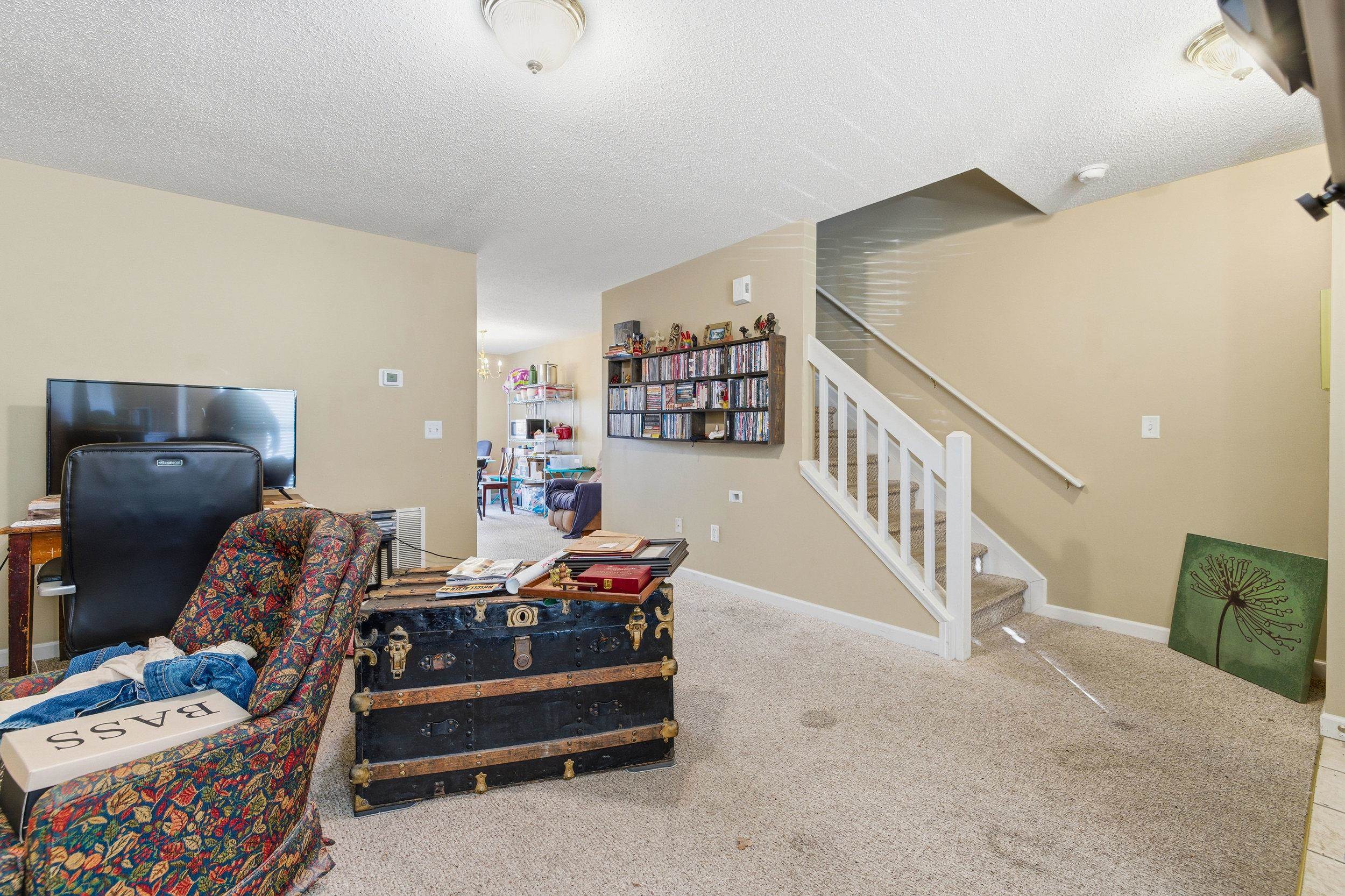 730 Merlins Way Harrisonburg, VA 22801 - Photo 6 of 23 a room with furniture and a book shelf