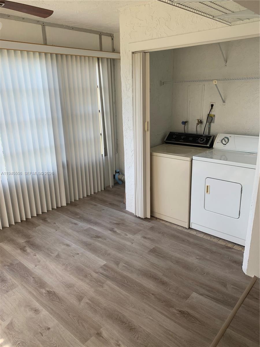 9273 Southwest 8th Street, Unit 411 Boca Raton, FL 33428 - Photo 9 of 21 a view of a storage & utility room