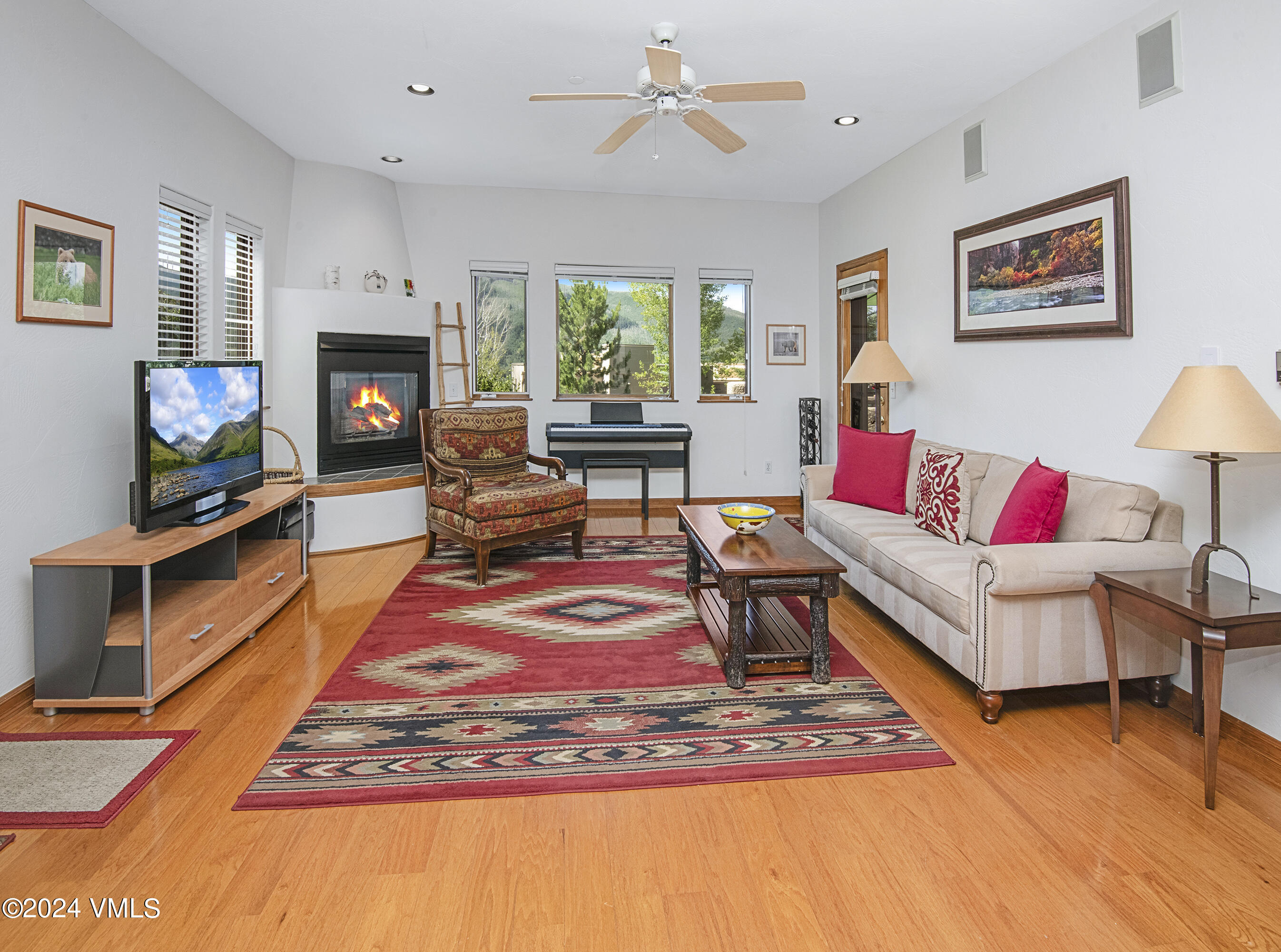 751 Singletree Road, Unit 3N Edwards, CO 81632 - Photo 11 of 35 a living room with furniture a rug and a fireplace