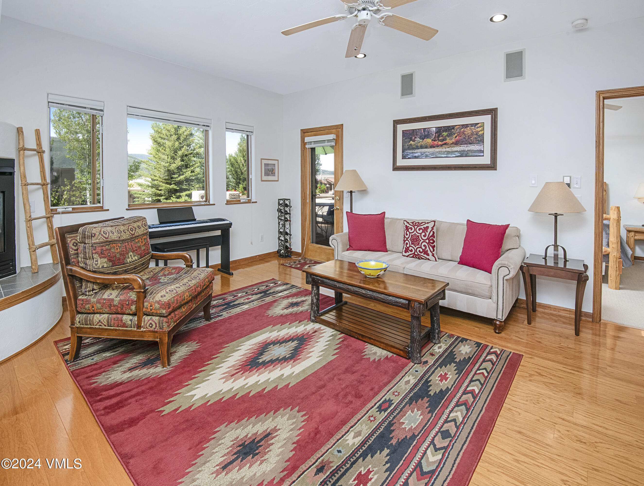 751 Singletree Road, Unit 3N Edwards, CO 81632 - Photo 12 of 35 a living room with furniture a rug and a large window