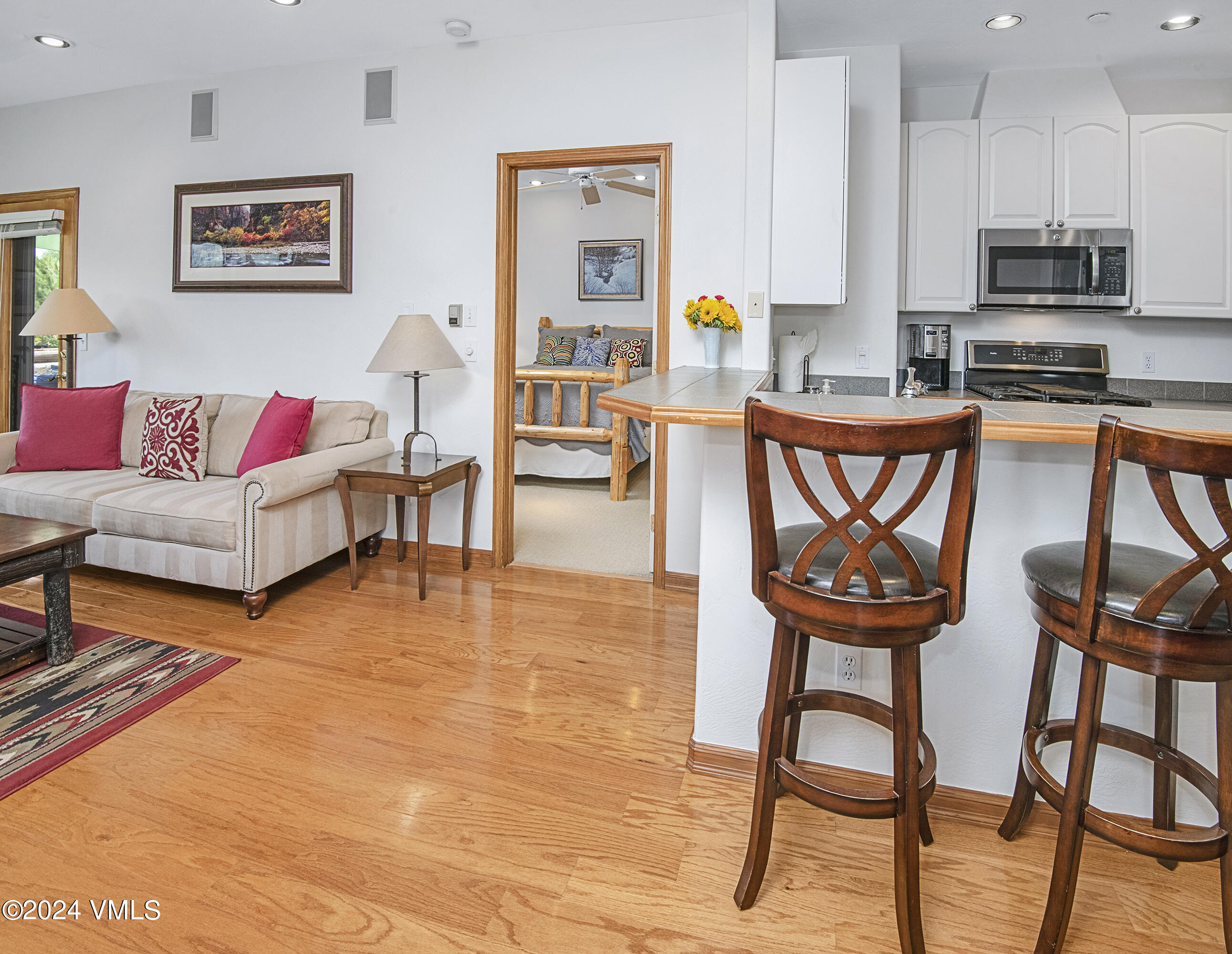 751 Singletree Road, Unit 3N Edwards, CO 81632 - Photo 17 of 35 a living room with furniture and a kitchen view