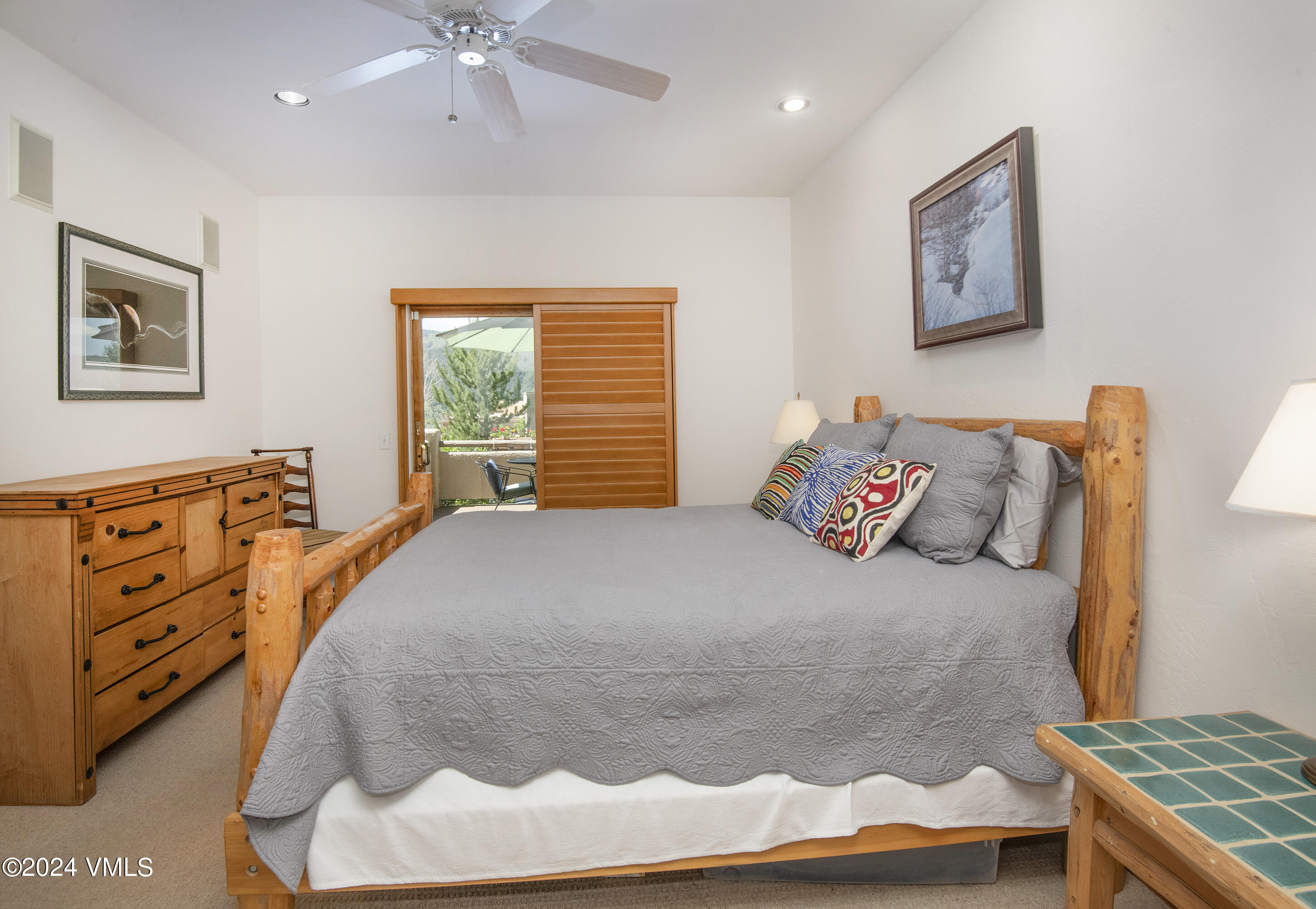 751 Singletree Road, Unit 3N Edwards, CO 81632 - Photo 21 of 35 a bedroom with a bed and a painting on the wall