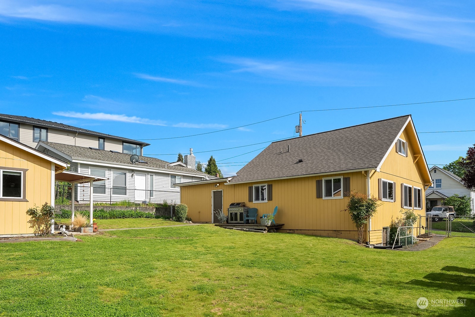 1202 North 29th Street Renton, WA 98056 - Photo 19 of 35 a front view of a house with a yard