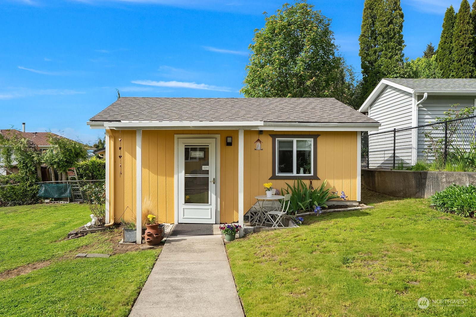1202 North 29th Street Renton, WA 98056 - Photo 20 of 35 a front view of house with yard and green space