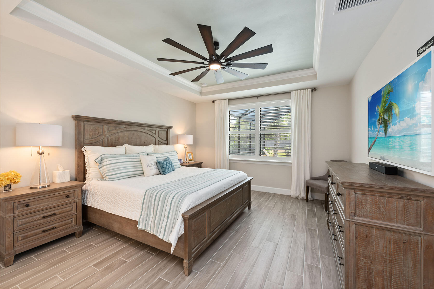 2714 Aviamar Circle Naples, FL 34114 - Photo 11 of 53 a bedroom with a bed and a window