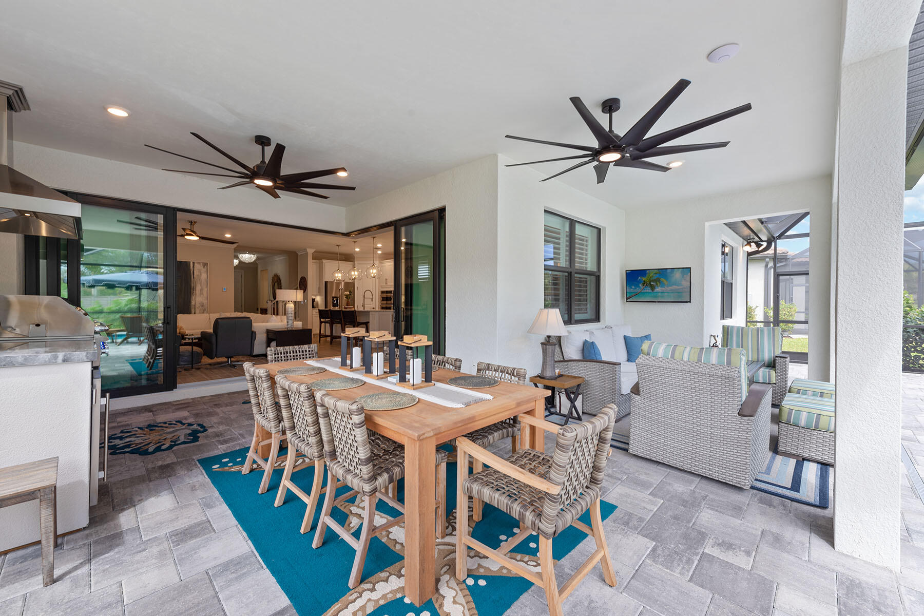 2714 Aviamar Circle Naples, FL 34114 - Photo 23 of 53 a view of a dining room with furniture window and wooden floor
