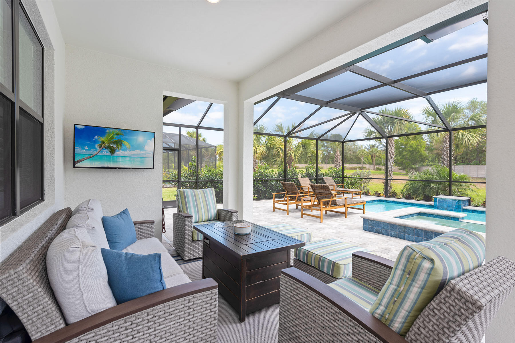 2714 Aviamar Circle Naples, FL 34114 - Photo 25 of 53 a living room with furniture and a large window