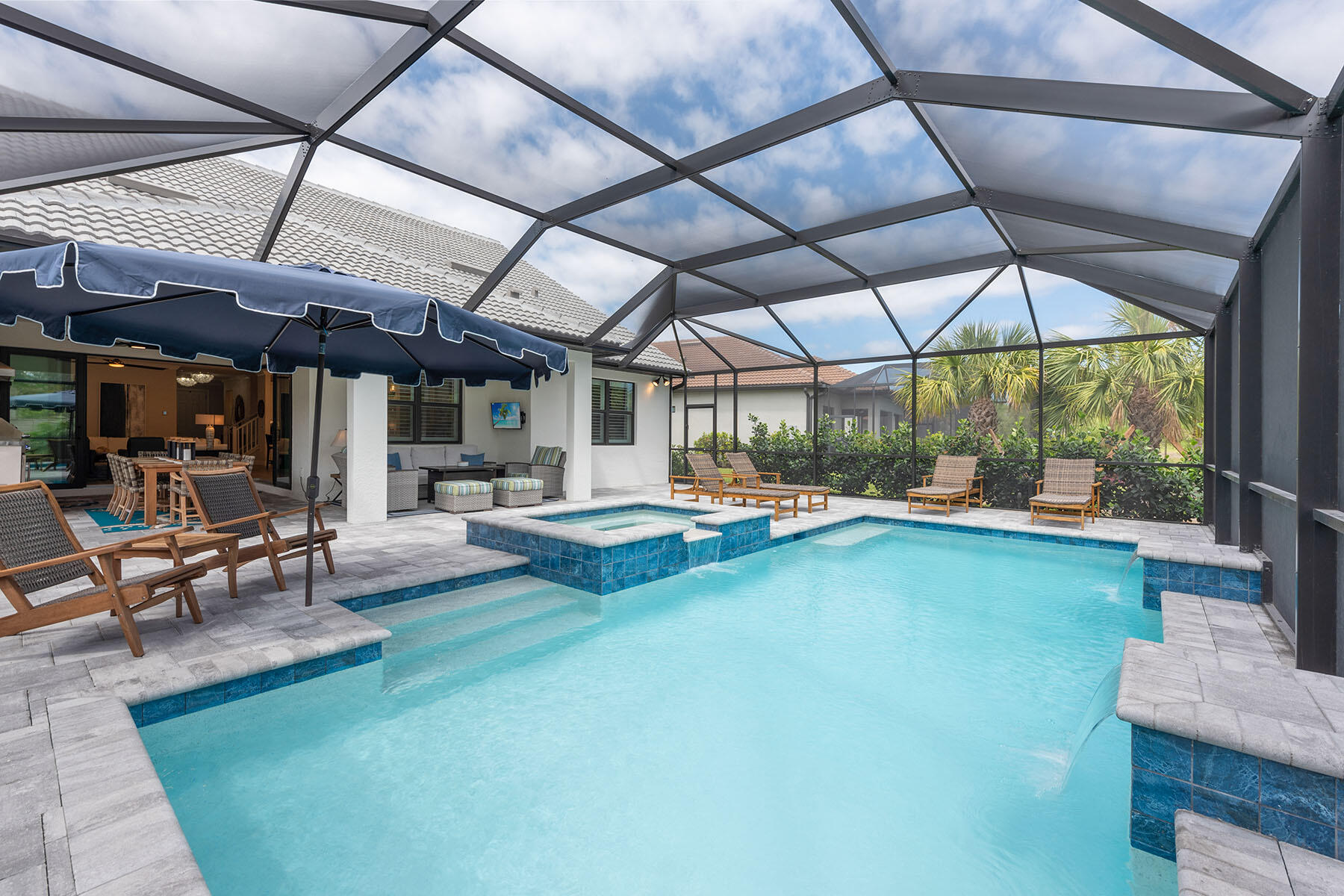 2714 Aviamar Circle Naples, FL 34114 - Photo 26 of 53 a view of swimming pool with outdoor seating
