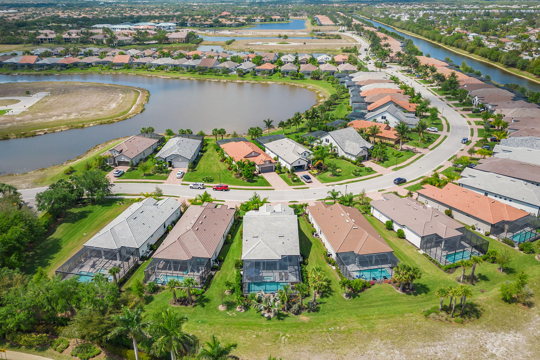 2714 Aviamar Circle Naples, FL 34114 - Photo 36 of 53 an aerial view of residential houses with outdoor space