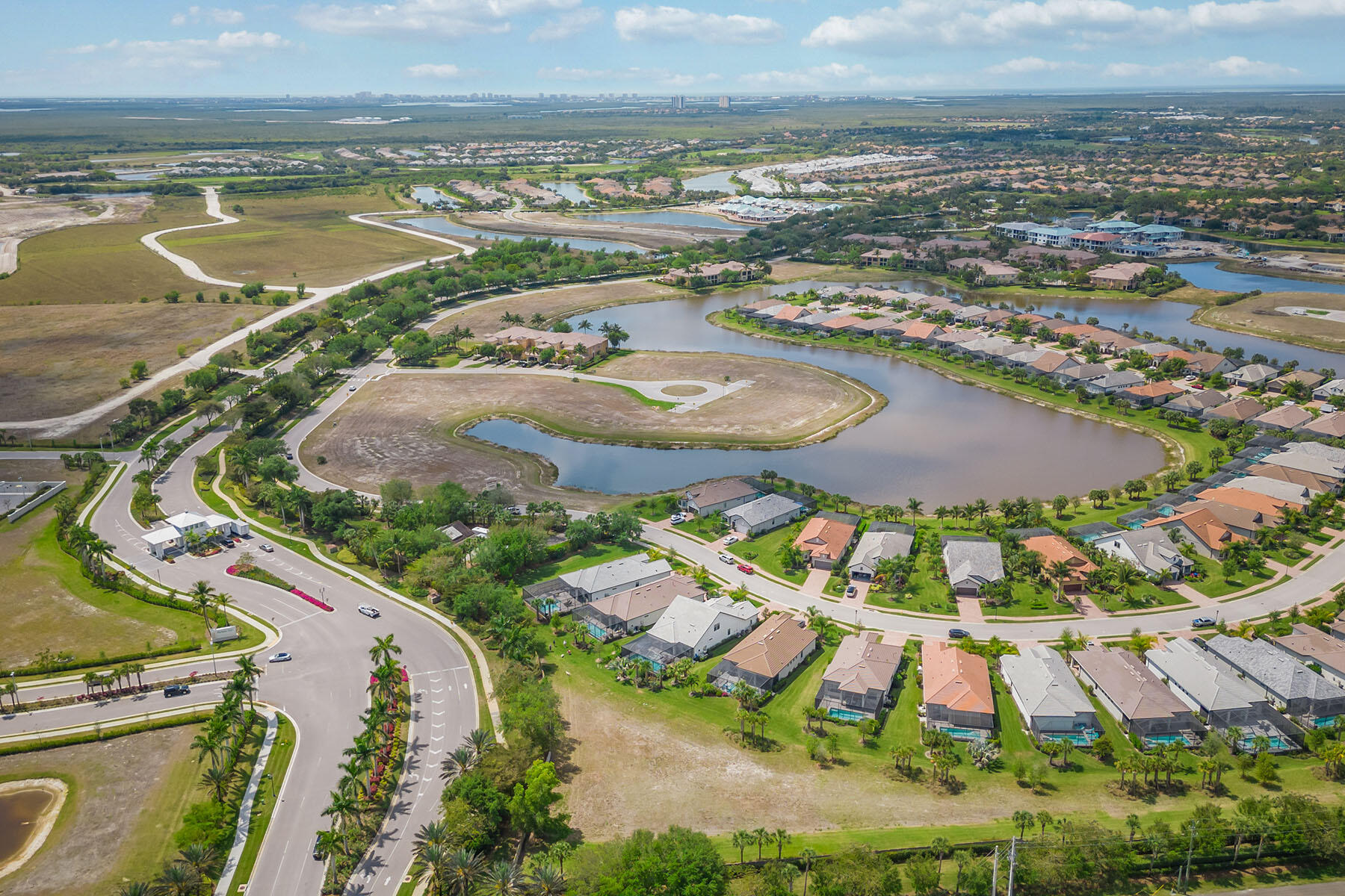 2714 Aviamar Circle Naples, FL 34114 - Photo 37 of 53 an aerial view of residential houses with outdoor space