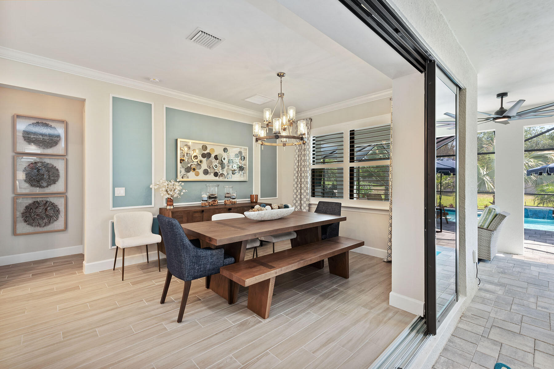 2714 Aviamar Circle Naples, FL 34114 - Photo 10 of 53 a view of a dining room with furniture window and wooden floor