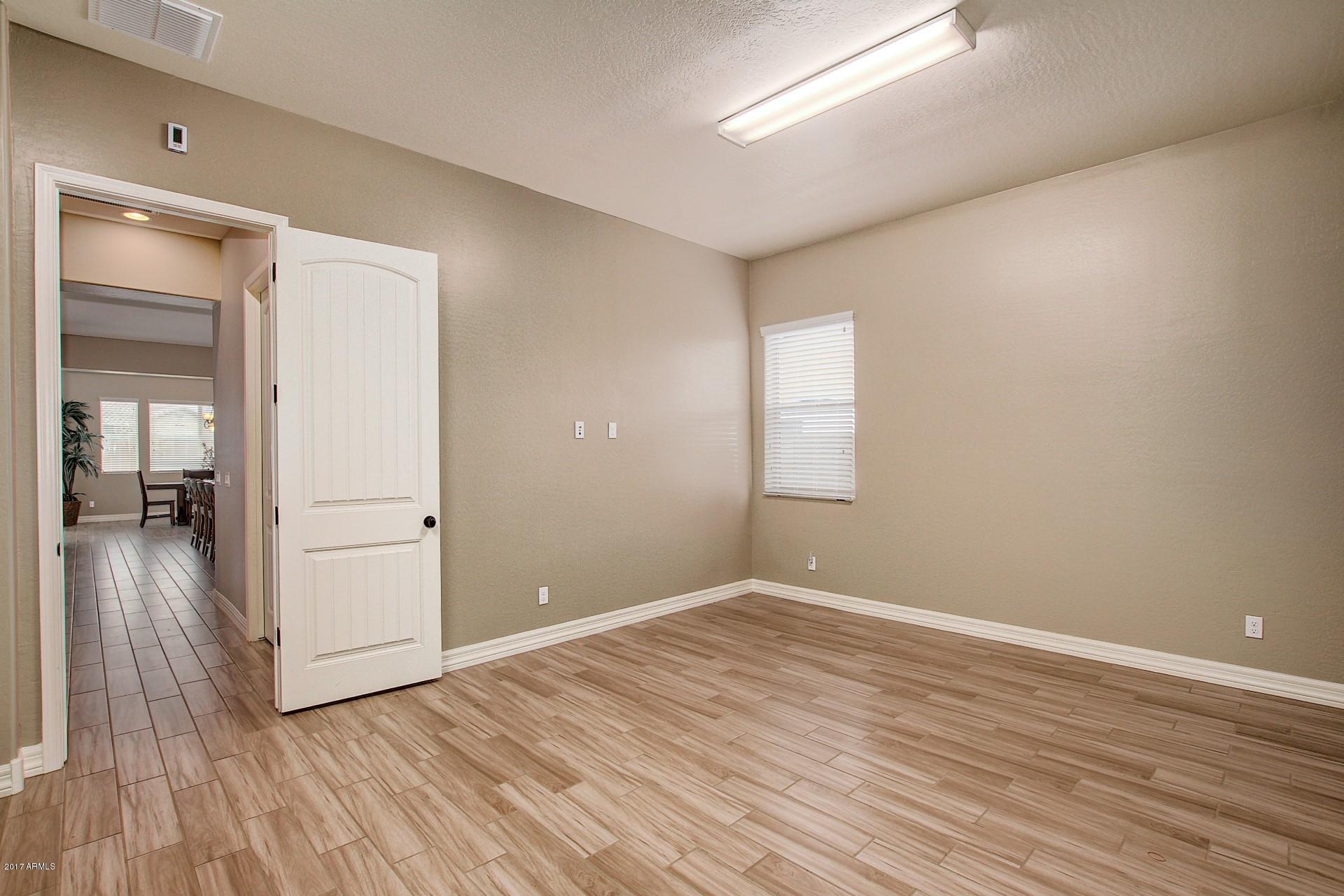19265 Walnut Road Queen Creek, AZ 85142 - Photo 33 of 41 Laundry.Craft room
