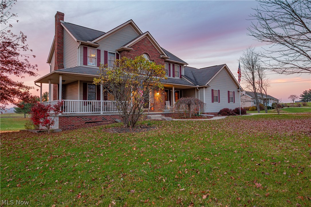 8666 Guilford Road Seville, OH 44273 - Photo 2 of 33 Wrap around front porch.