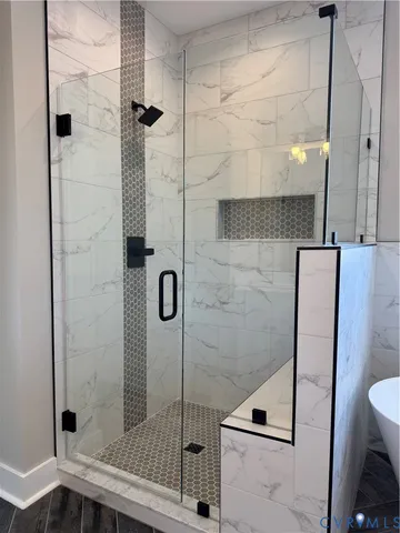 a bathroom with a shower and a toilet