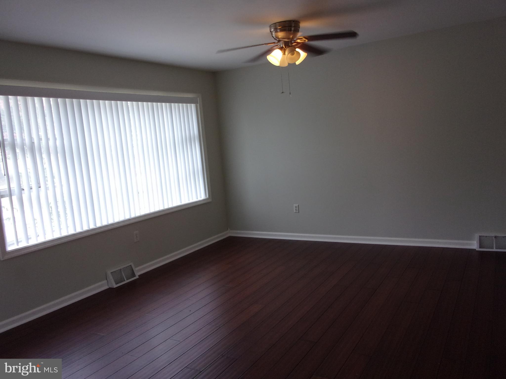 309 Bryanstone Road Reisterstown, MD 21136 - Photo 3 of 25 Bright and inviting living room