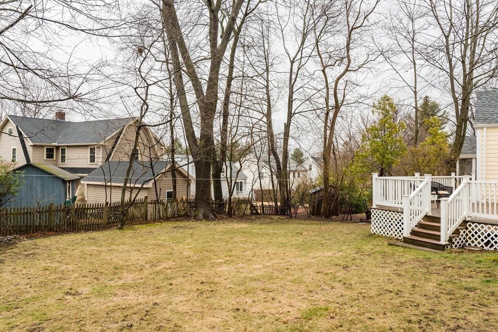 104 Bertwell Road Lexington, MA 02420 - Photo 31 of 32 a view of a yard with a house