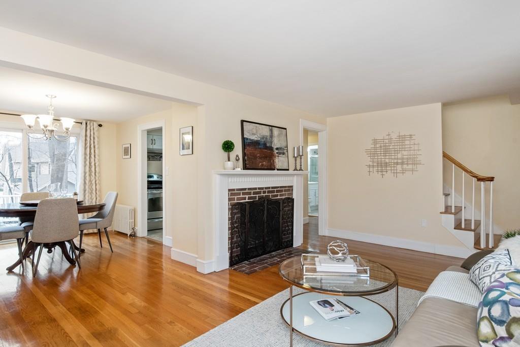 104 Bertwell Road Lexington, MA 02420 - Photo 6 of 32 a living room with furniture and a fireplace