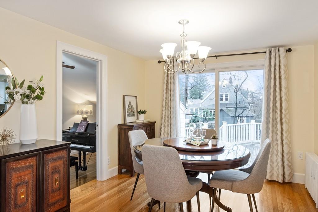 104 Bertwell Road Lexington, MA 02420 - Photo 7 of 32 a view of a dining room with furniture window and wooden floor