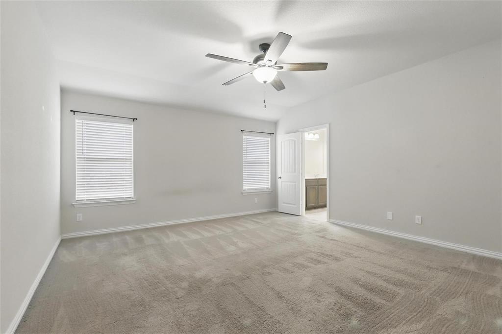 240 Springwood Ranch Loop Springtown, TX 76082 - Photo 13 of 27 a view of an empty room with a window
