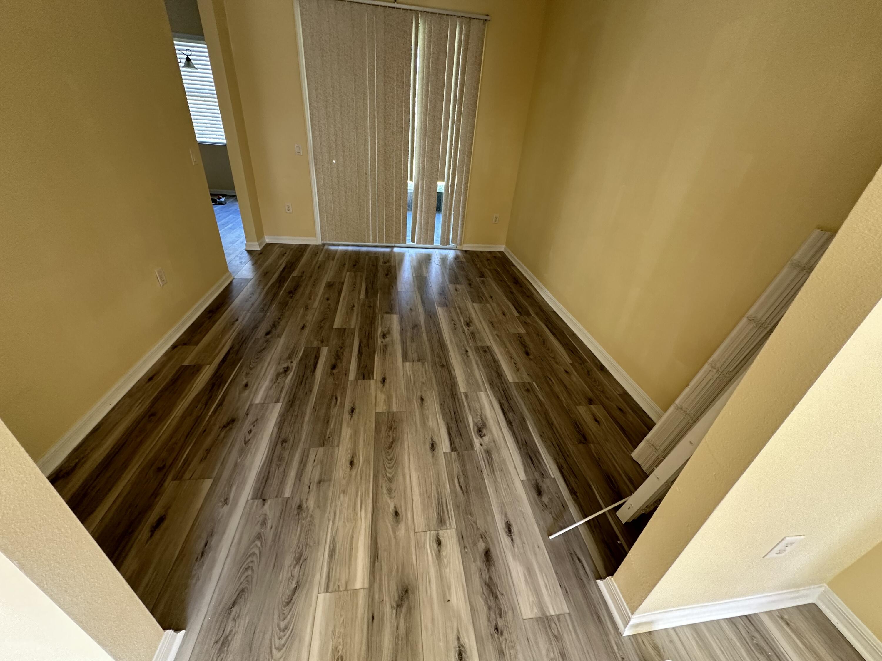 931 Dorchester Road Palm Bay, FL 32907 - Photo 5 of 13 a view of wooden floor