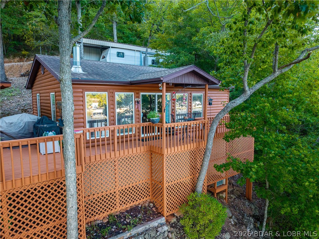 30501 Buchanan Road Stover, MO 65078 - Photo 22 of 80 log cabin + lake front + large dock = paradise