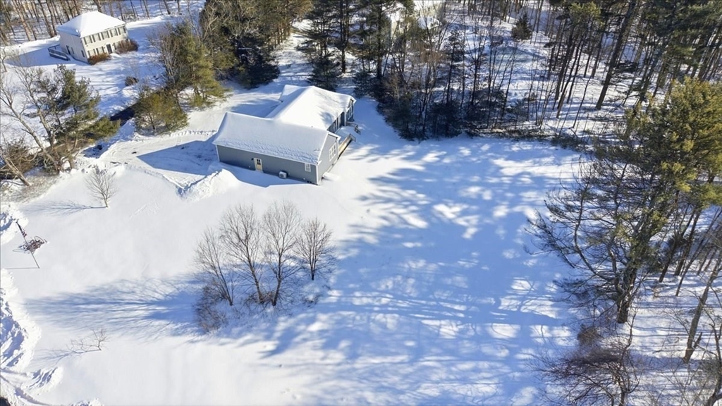 99 Maple Street Douglas, MA 01516 - Photo 19 of 24 a view of a backyard of the house