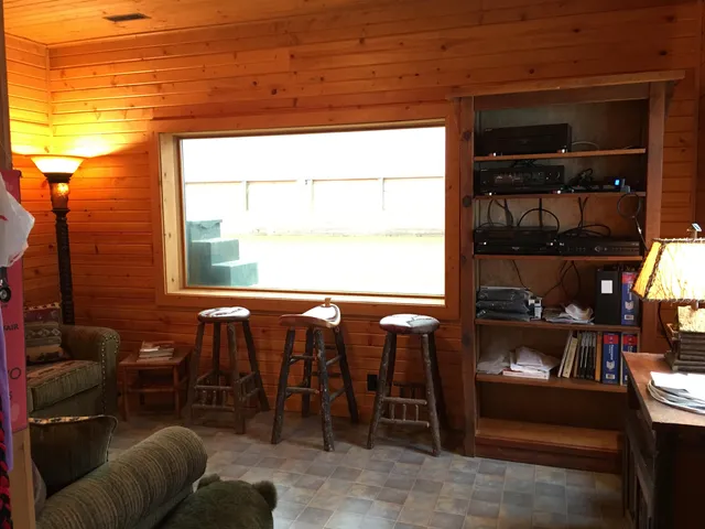 an aerial view of a house with outdoor space