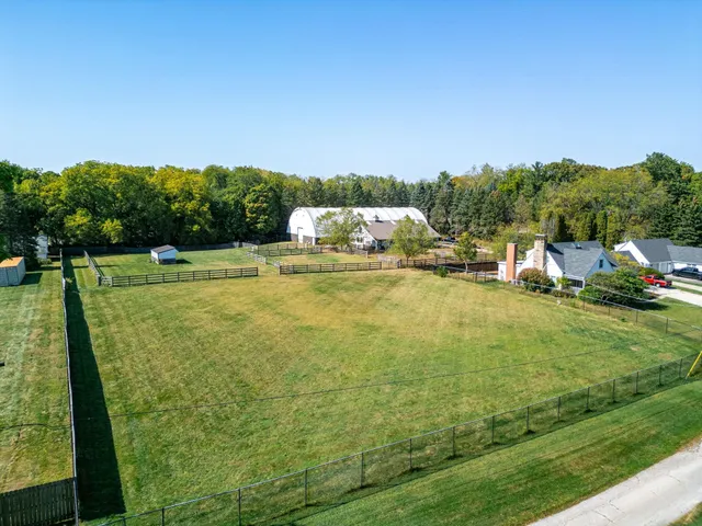 a view of yard along with trees