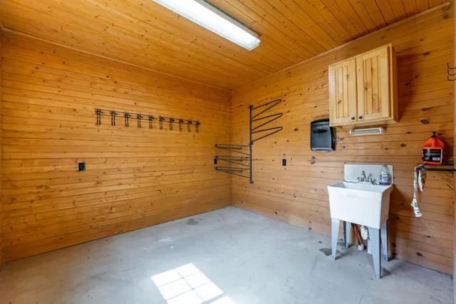 a kitchen with lots of counter top space and dining table