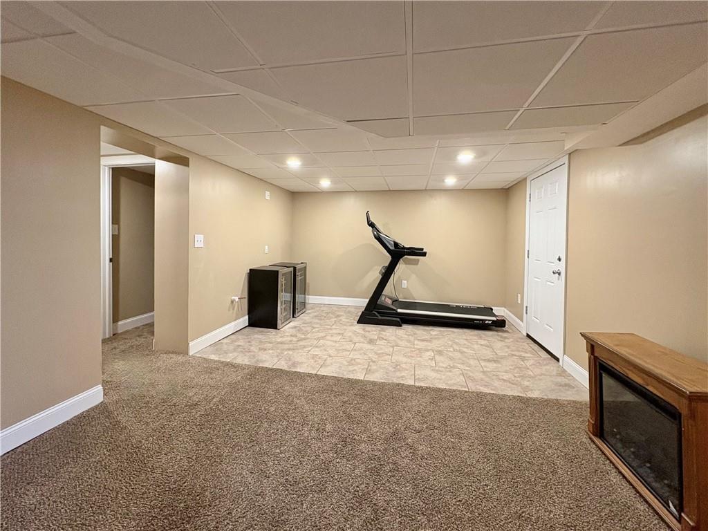 113 Briercliff Road Beaver Falls, PA 15010 - Photo 26 of 37 Lower Level Family Room - tiled area is plumbed for wet bar.