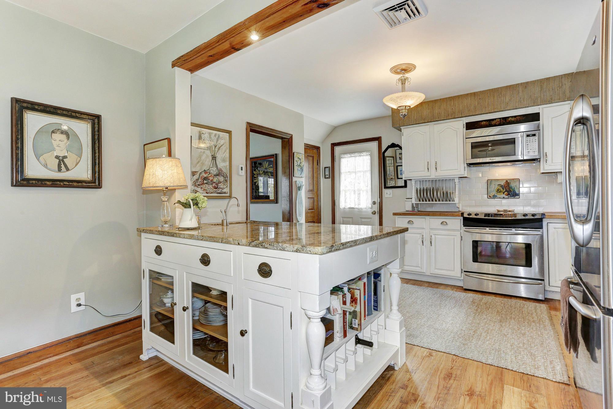 2022 Rocky Point Road Baltimore, MD 21221 - Photo 8 of 23 Gourmet Kitchen with Granite-Topped Center Island