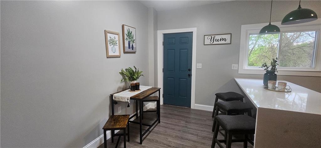 2311 Clinton Street Homestead, PA 15120 - Photo 14 of 38 a view of a workspace with furniture and a potted plant