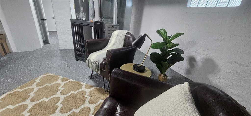2311 Clinton Street Homestead, PA 15120 - Photo 23 of 38 a floor to ceiling window and potted plant on a table