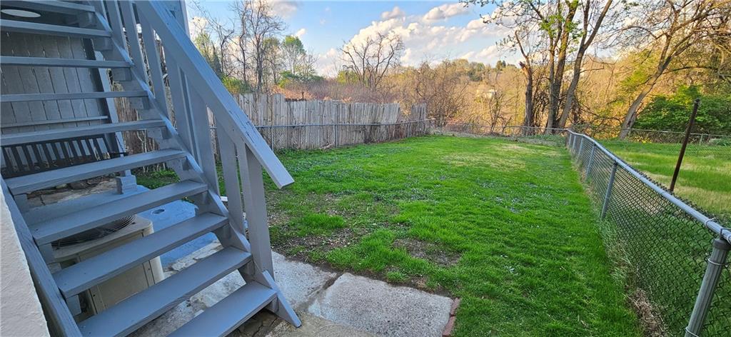 2311 Clinton Street Homestead, PA 15120 - Photo 32 of 38 a view of a backyard with a trees