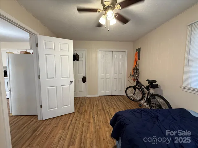 a view of a livingroom with wooden floor