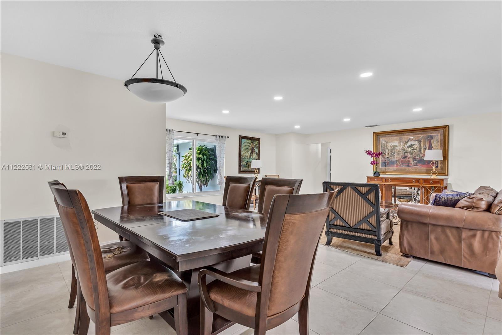 10820 Eureka Street Boca Raton, FL 33428 - Photo 25 of 39 a view of a dining room with furniture