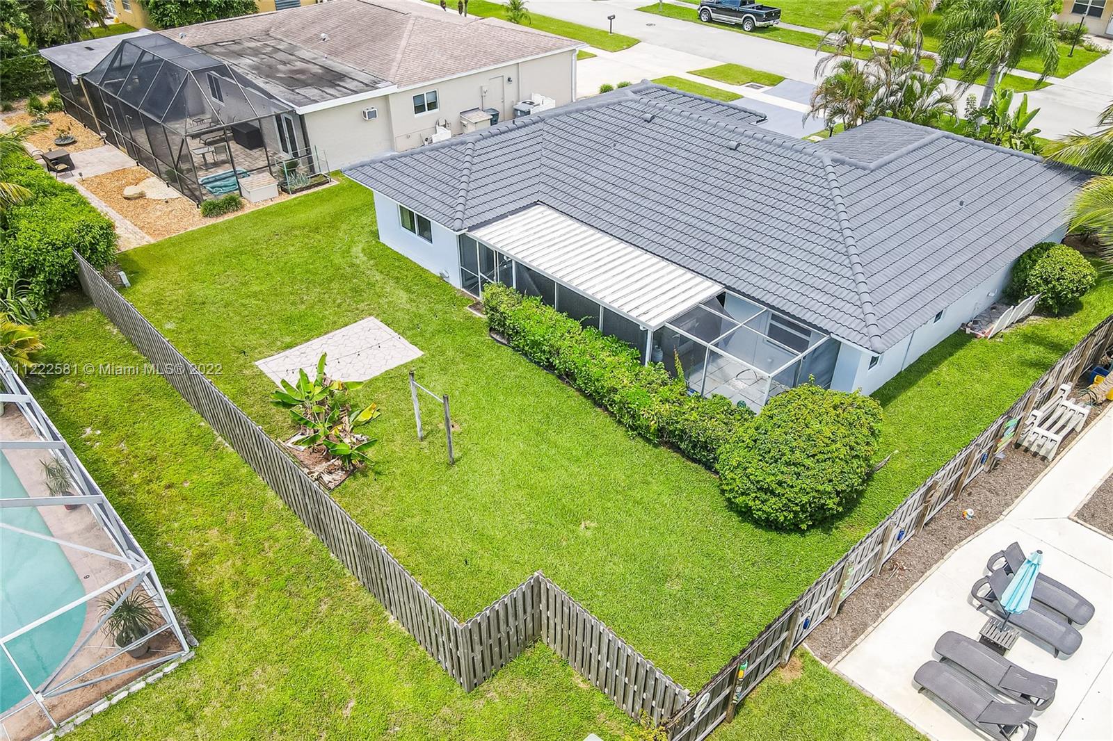 10820 Eureka Street Boca Raton, FL 33428 - Photo 8 of 39 a aerial view of a house with a yard