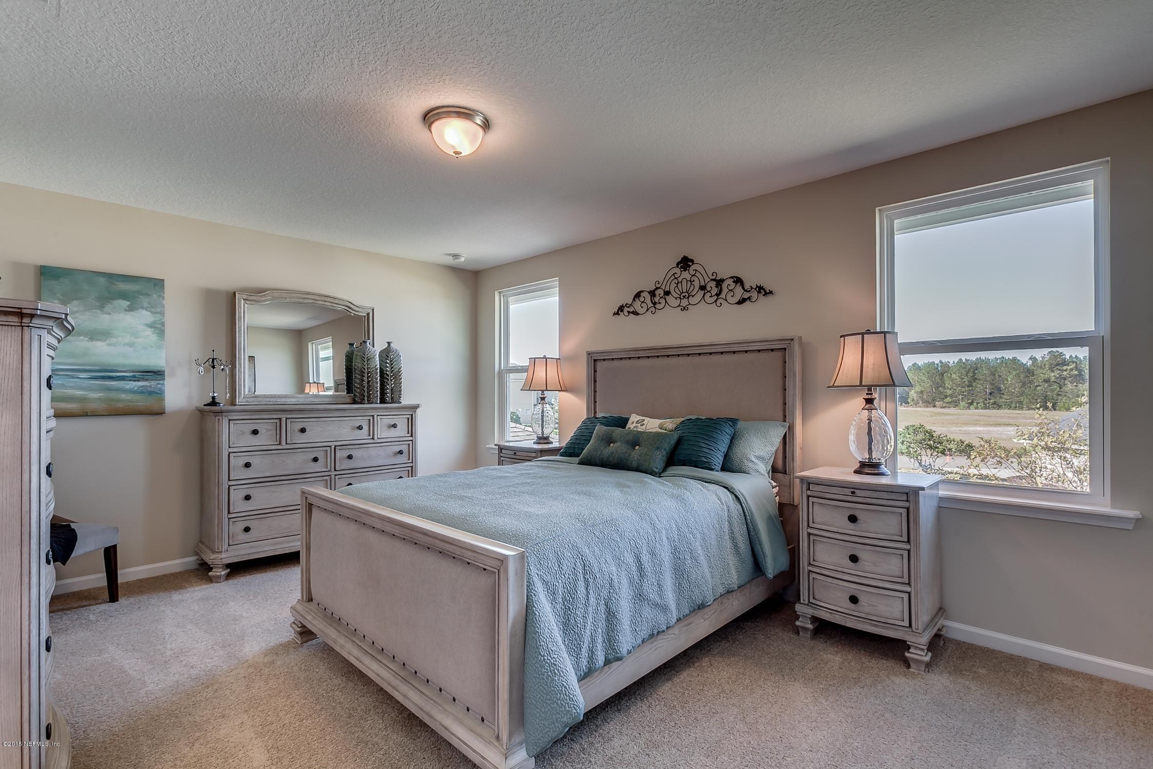 3148 Chestnut Ridge Way, Unit 12A Orange Park, FL 32065 - Photo 21 of 28 Master_Bedroom_View_1