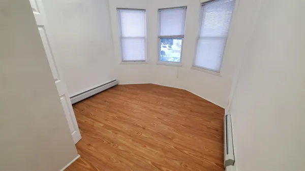 an empty room with windows
