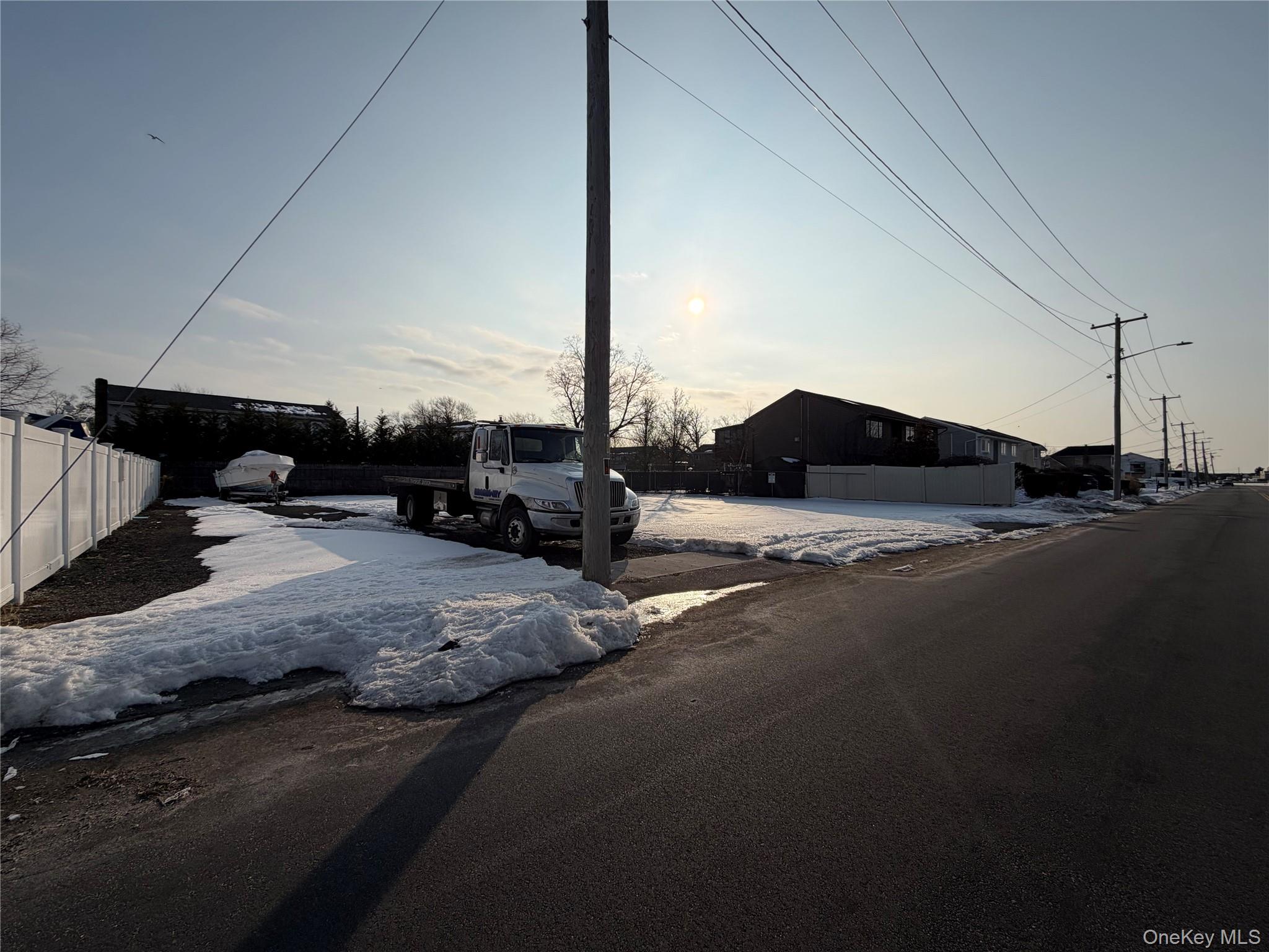 628 Shore Road Lindenhurst, NY 11757 - Photo 5 of 7 a car parked on the side of the road