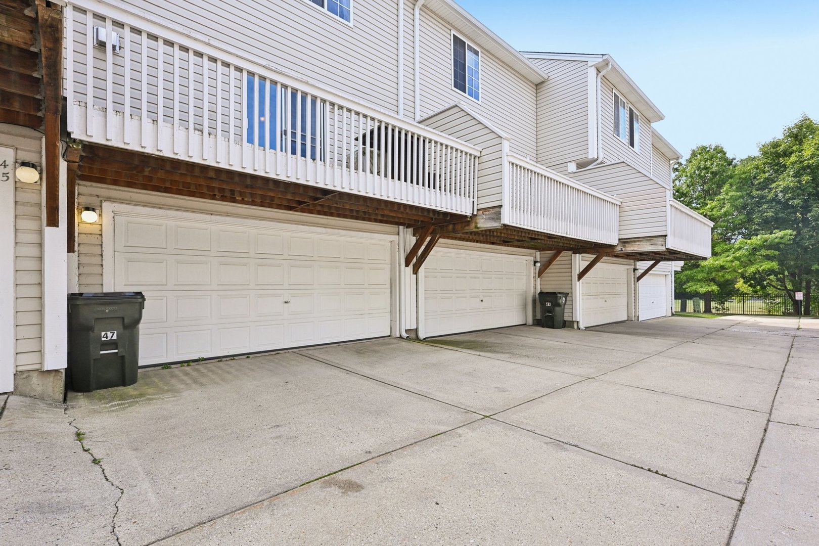 47 South Treehouse Lane Round Lake, IL 60073 - Photo 20 of 23 a view of a house with a garage