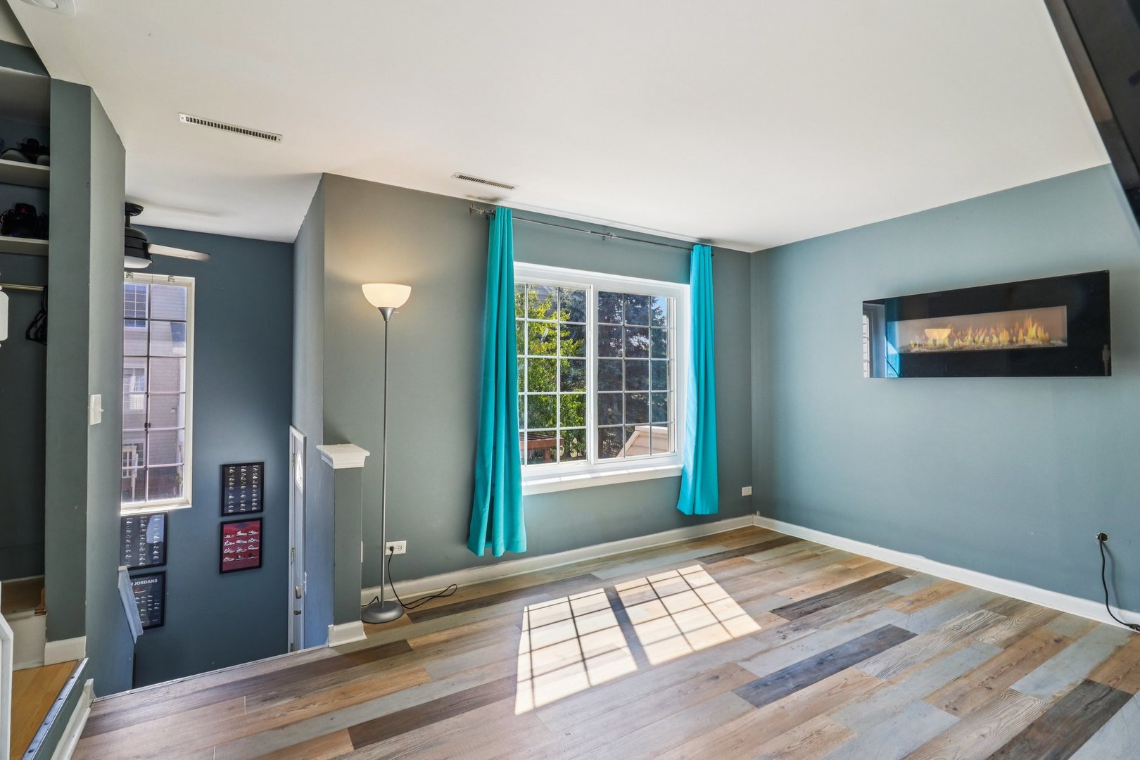 47 South Treehouse Lane Round Lake, IL 60073 - Photo 2 of 23 a view of a bedroom with wooden floor and a window