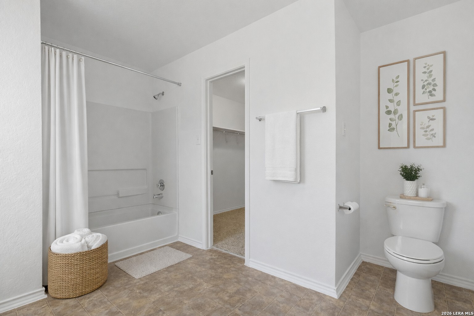 9819 Hawk Shore Converse, TX 78109 - Photo 15 of 26 a bathroom with a toilet and a shower