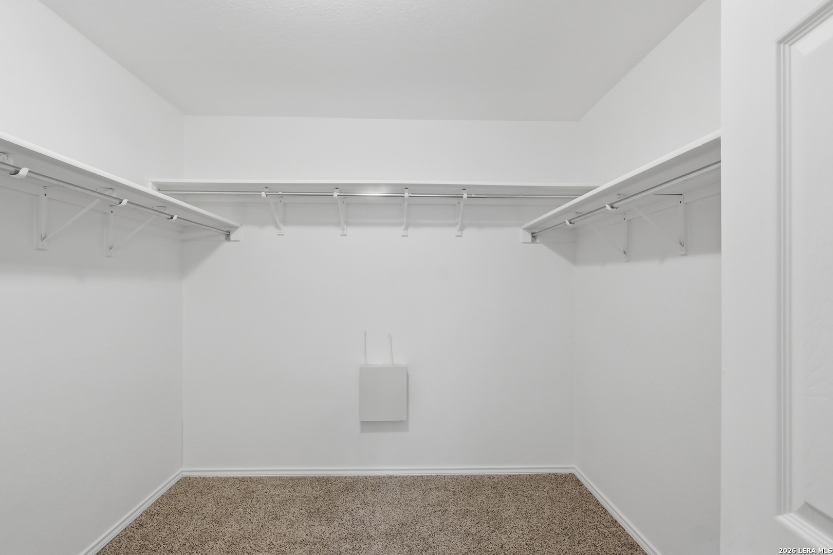 9819 Hawk Shore Converse, TX 78109 - Photo 16 of 26 a view of an empty walk in closet
